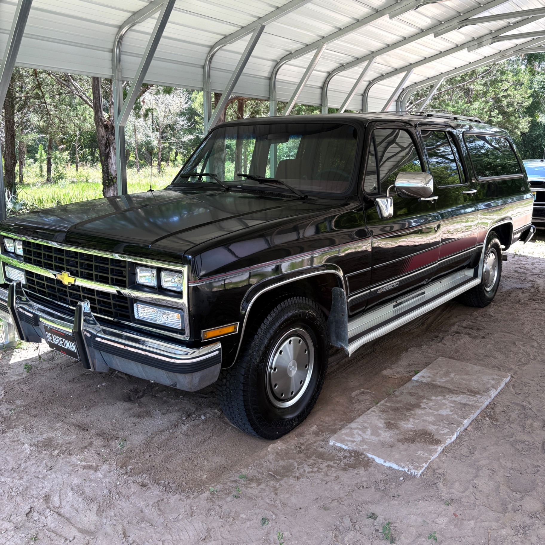 Black Chevy Suburban โ before and after detail in Ocala, FL โ after