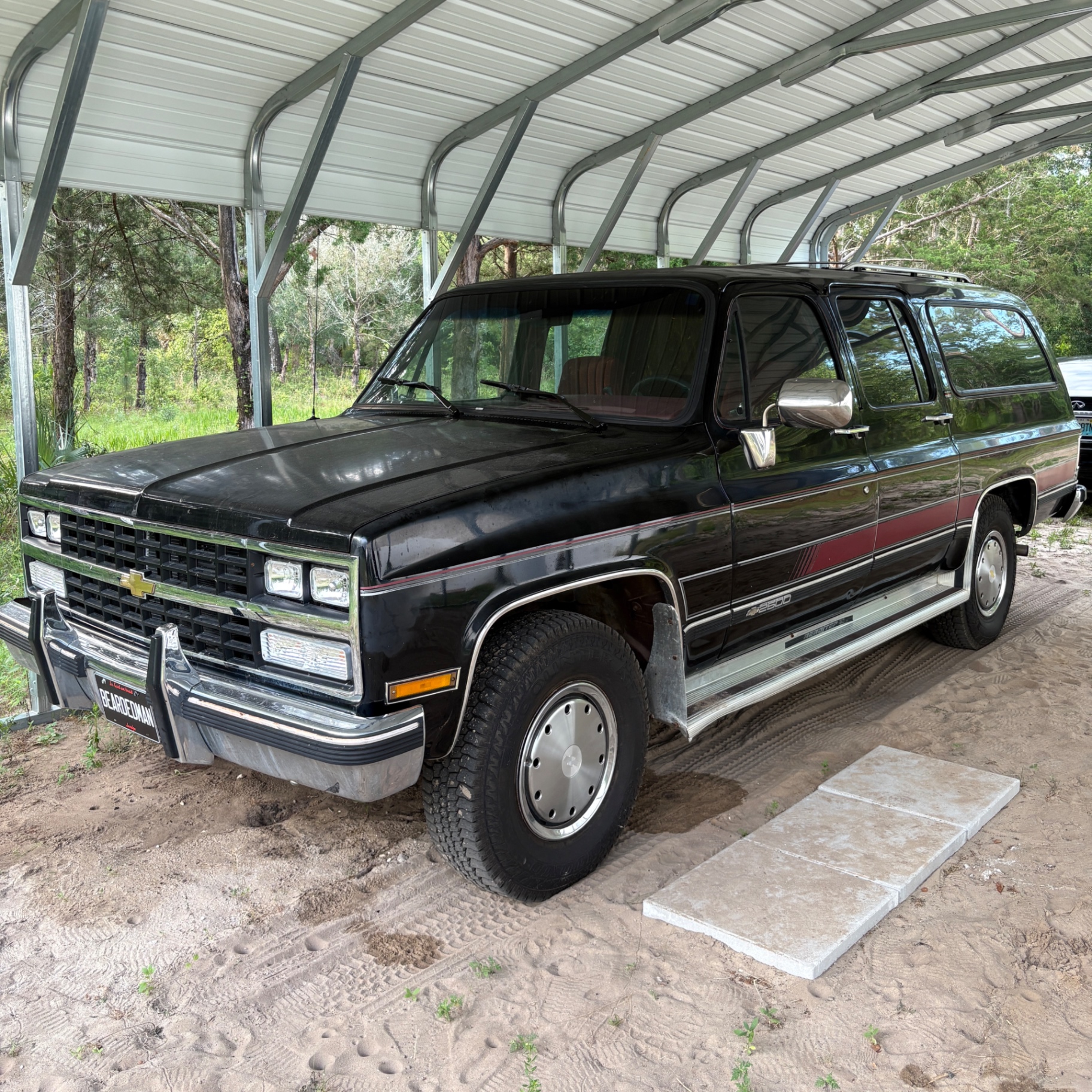 Black Chevy Suburban โ before and after detail in Ocala, FL โ before